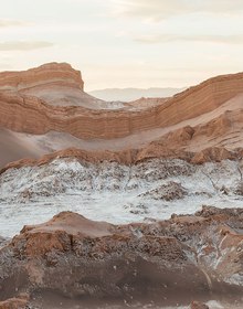 A dune curving between salt-crusted ridges in the Valle de la Luna