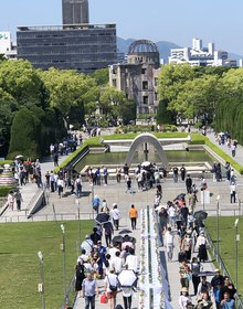 Down Tange's axis: the cenotaph arch, the flame, and the dome
