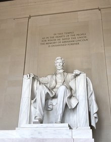 Lincoln seated in the chamber