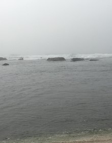 Whitewater and the sand at the shoreline