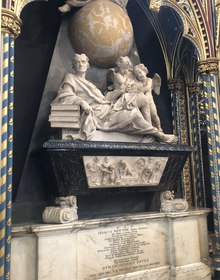 Newton's marble monument, reclining figure beneath a celestial globe