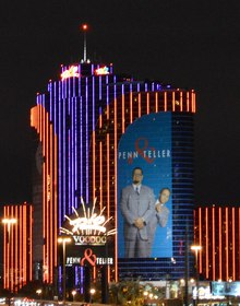 The Rio at night, the two of them ten storeys high on the tower