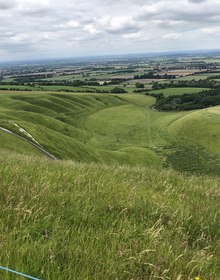 The chalk downs falling away from the track