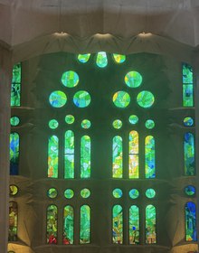 The cool green and blue glass opposite