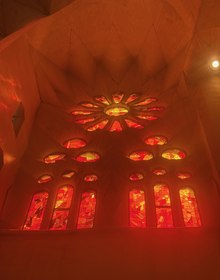 Light from the rose window across the vault