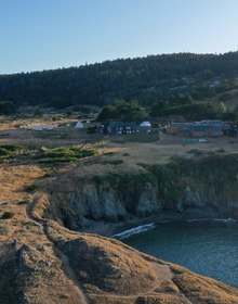 Bluff trail down to a pocket beach at first light
