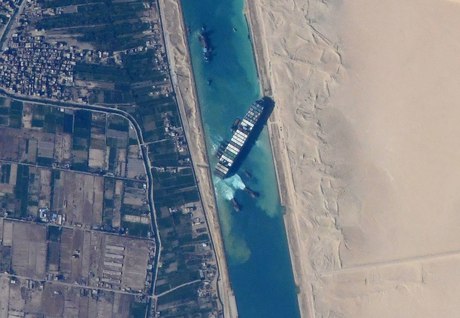 The Ever Given wedged across the canal, from orbit