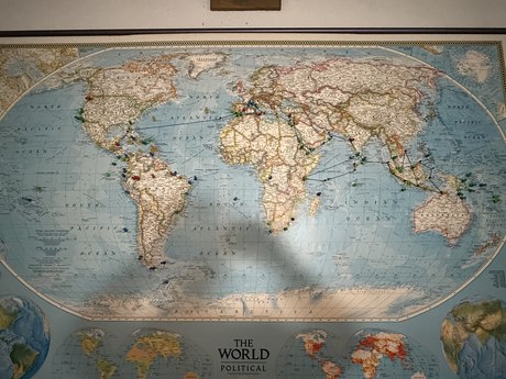 The world map on the ranch library wall