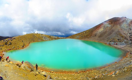 An emerald crater lake on the crossing